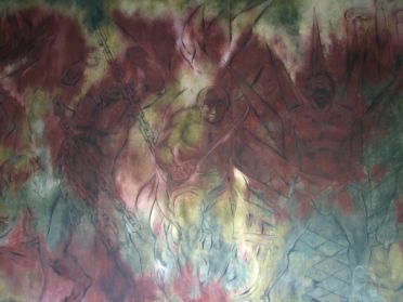 De superbes fresques de Pachero racontant l'histoire des Mayas ornent les murs du palais